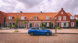 Blue car in a dutch street