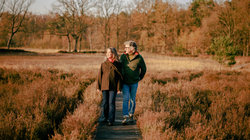 Senior couple walks in nature
