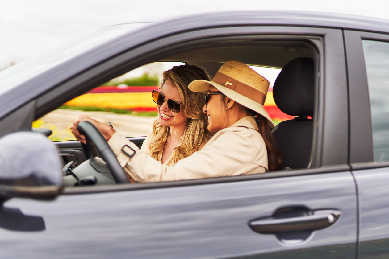 two women in the car at the tulipfield