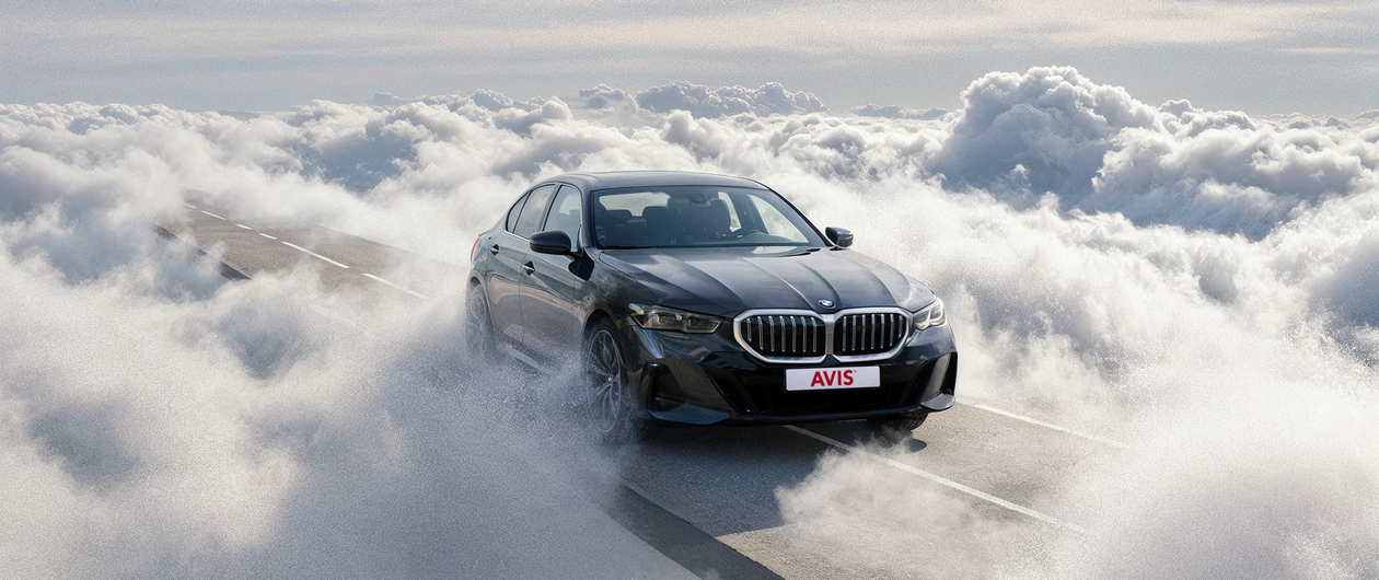 Car drives on the road in the sky