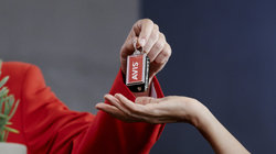 Handing over Avis key at the counter