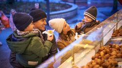 Family at an oliebollen stall